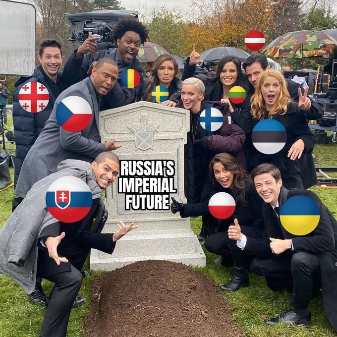 happy people with flags of many European nations gather around a grave captioned 'Russia's imperial future'