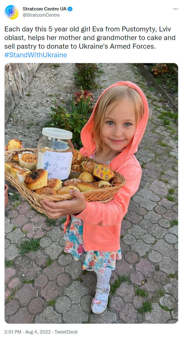 each day 5-year-old Eva from Pustomyty, Lviv, helps her mother and grandmother sell cake and pastry to donate to Ukraine's Armed Forces