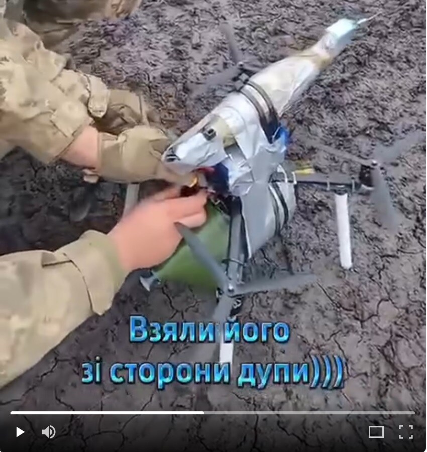 Ukrainians disarm a Russian drone.