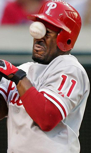 baseball player getting beaned in the face