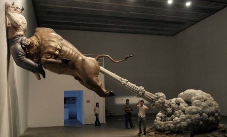 statue of bull rocketing through the air by farting