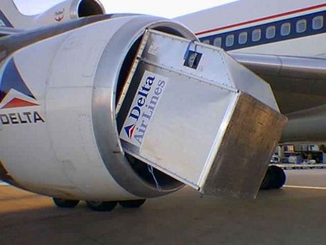 Delta luggage container jammed into Delta plane engine