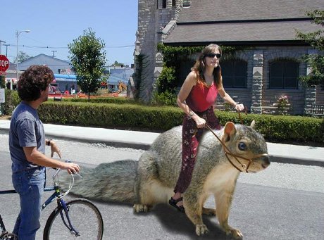 woman riding on giant squirrel