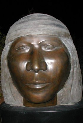 bronze sculpture of a woman's head