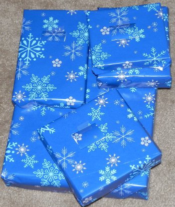 a bunch of presents wrapped in blue paper, 'Blue Christmas'