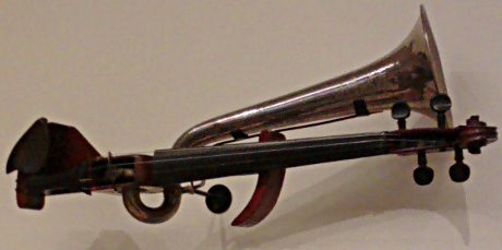 violin with horn attached instead of a soundboard