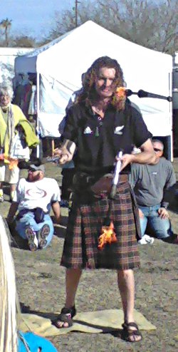 juggler wearing a kilt