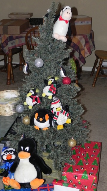 Christmas tree with a bunch of penguins in it