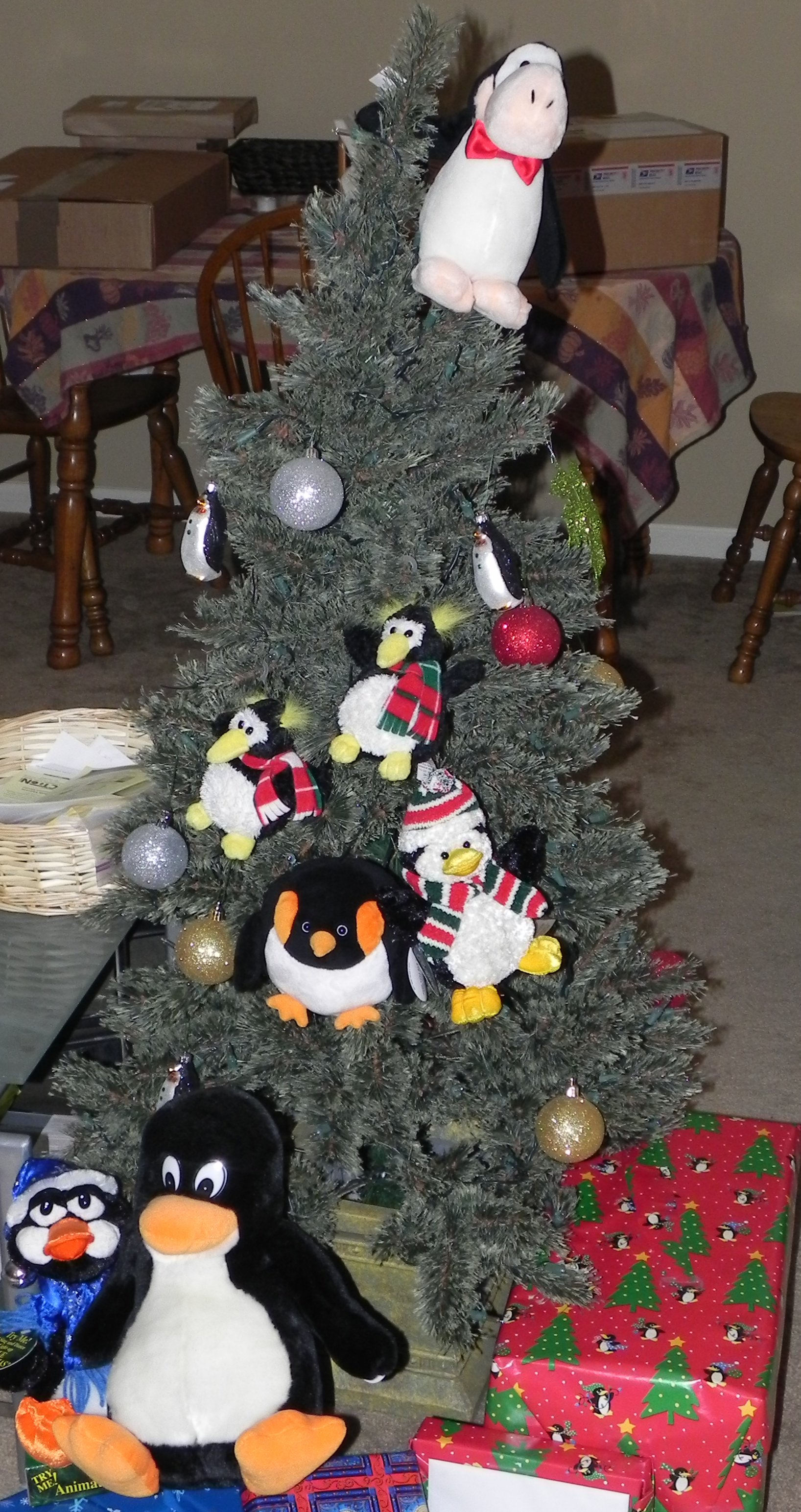 Christmas tree with a bunch of penguins in it