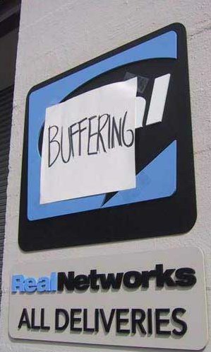 Real Networks sign, with 'Buffering' taped to it