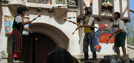 the London Broil doing team juggling with flaming torches