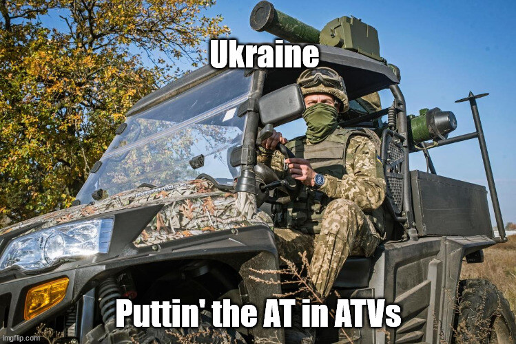 Ukraine soldier in vehicle with anti-tank missile launcher.  Ukraine, puttin' the AT in ATVs