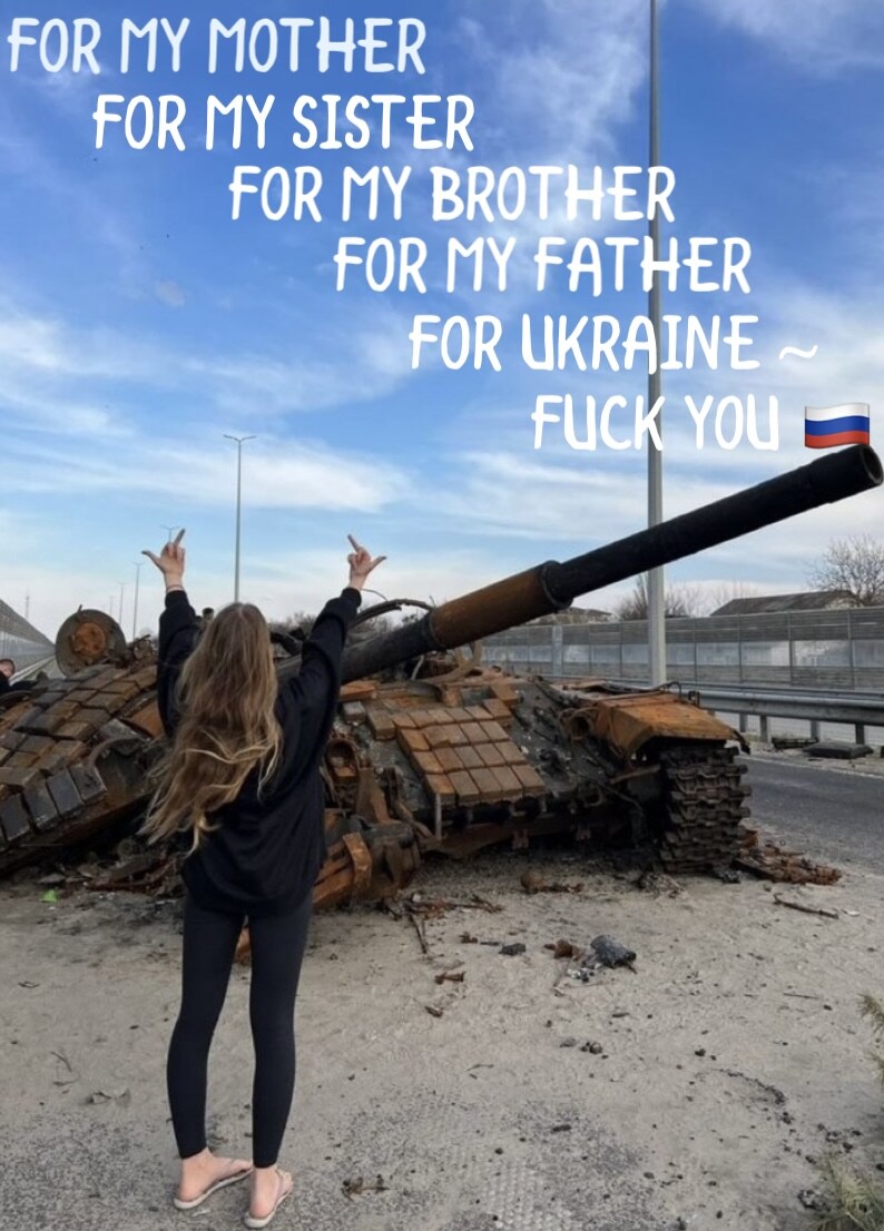 Woman flips off destroyed Russian tank, caption 'For my mother, my sister, my brother, my father, for Ukraine, fuck you Russia!'