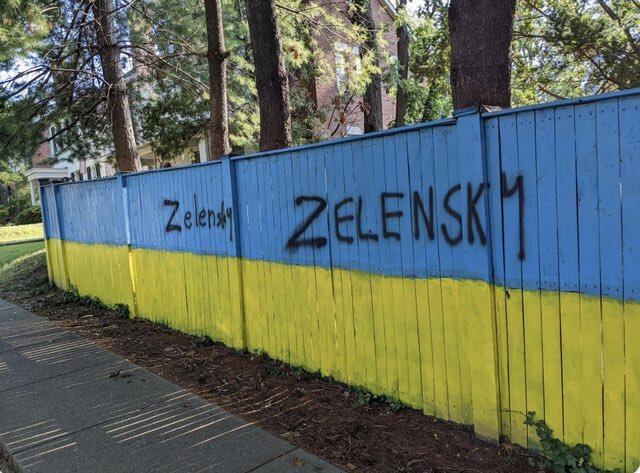 Ukraine flag fence was vandalized with Z markings, then someone turned the Zs into Zelensky