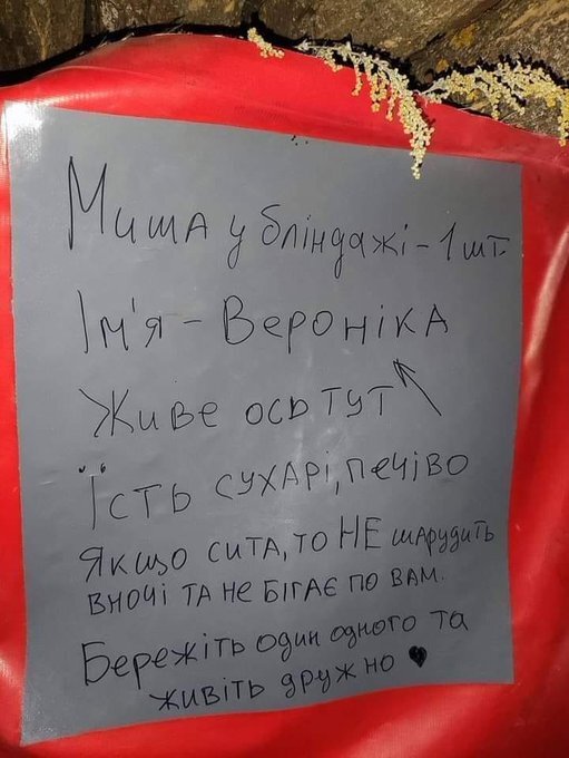sign left by Ukrainian soldiers telling the next people there how to take care of the mouse Veronika