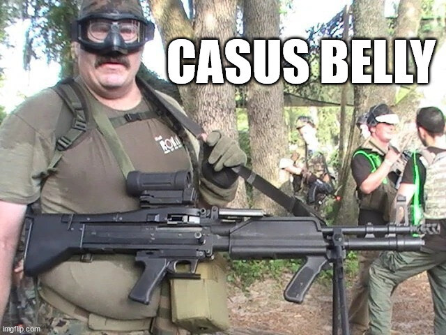 fat guy with rifle playing Army, captioned 'Casus Belly'