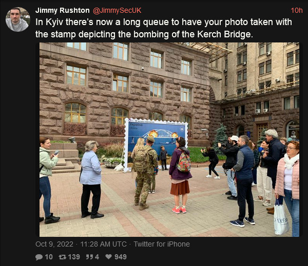 In Kyiv, there's now a long queue to have your photo taken with the stamp depicting the bombing of the Kerch Bridge.