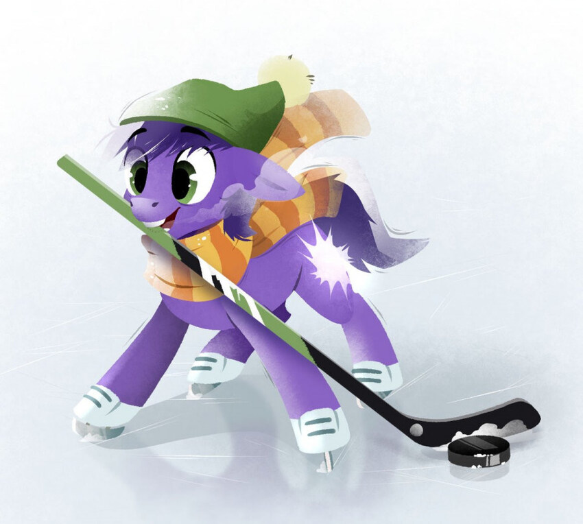 pony with skates and hockey stick on ths ice