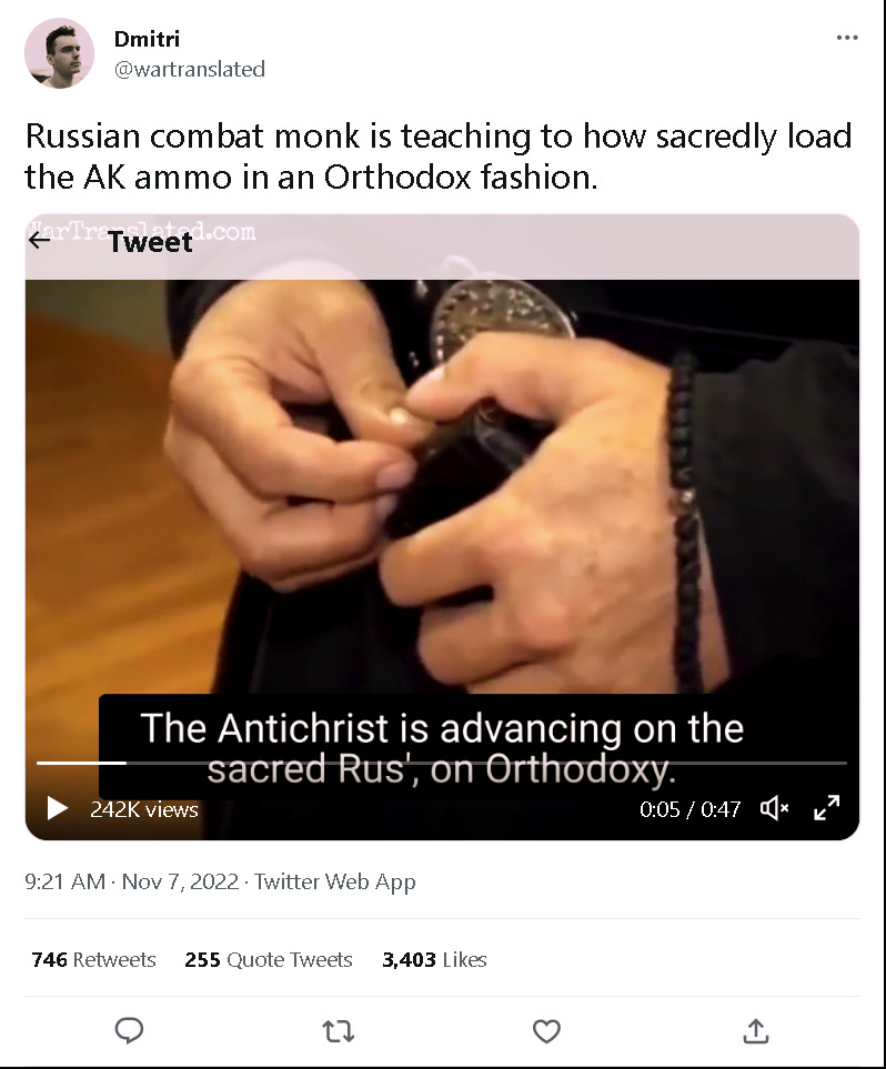 Russian combat monk is teaching how to sacredly load the AK ammo in an Orthodox fashion