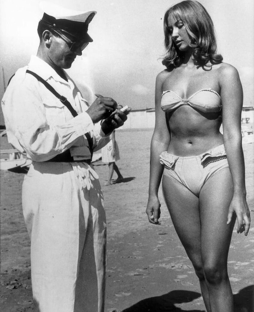 sailor and cute woman in a bikini