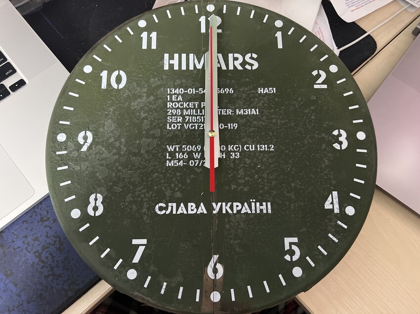 clock made out of a HIMARS rocket pod cover