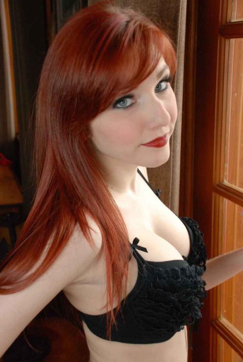 redhead in black bikini