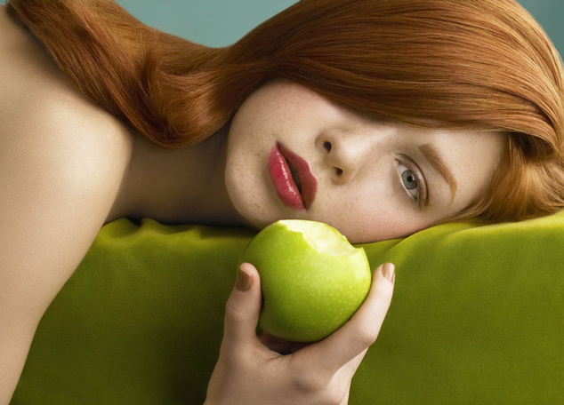 redhead with apple