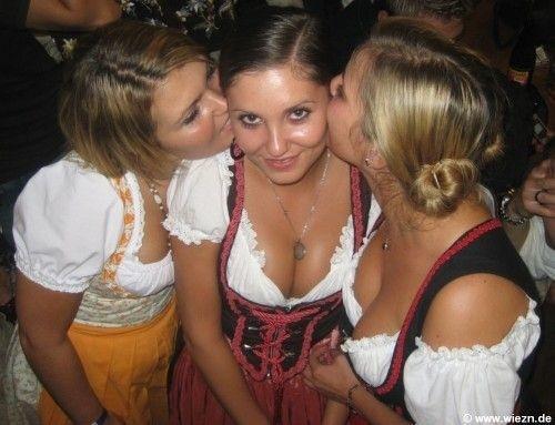 women in dirndls kissing each other