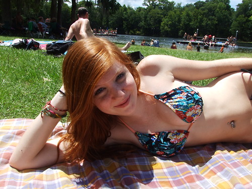 redhead with blue bikini