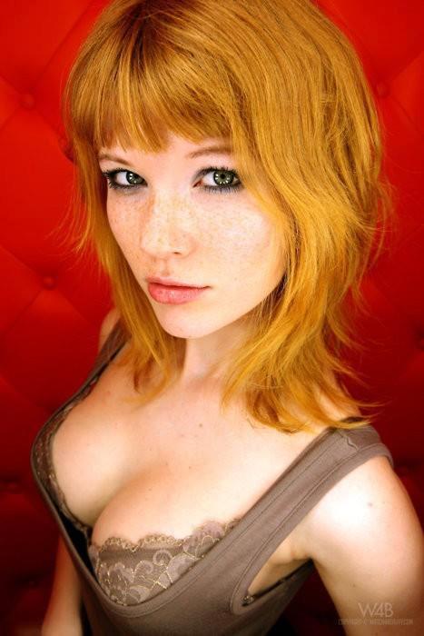 redhead on a red background