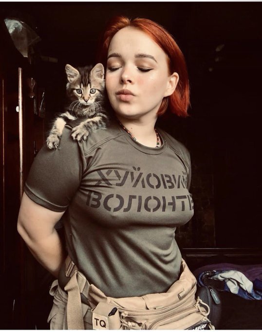 Ukrainian redhead with kitten