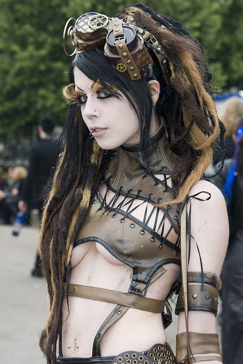 a steampunk goth brunette with an interesting bra